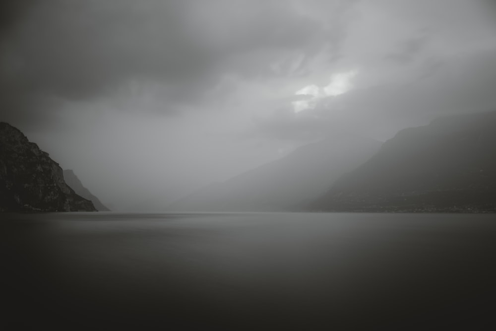 a black and white photo of a body of water