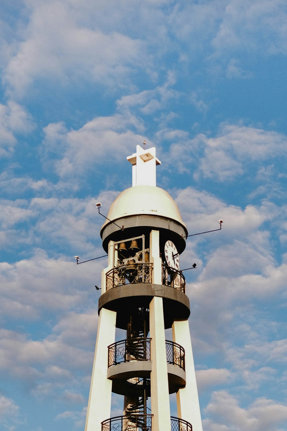 a tall tower with a clock on the top of it