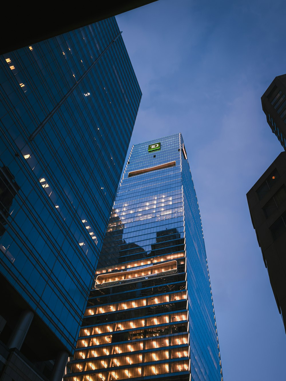 a very tall building with a sky background