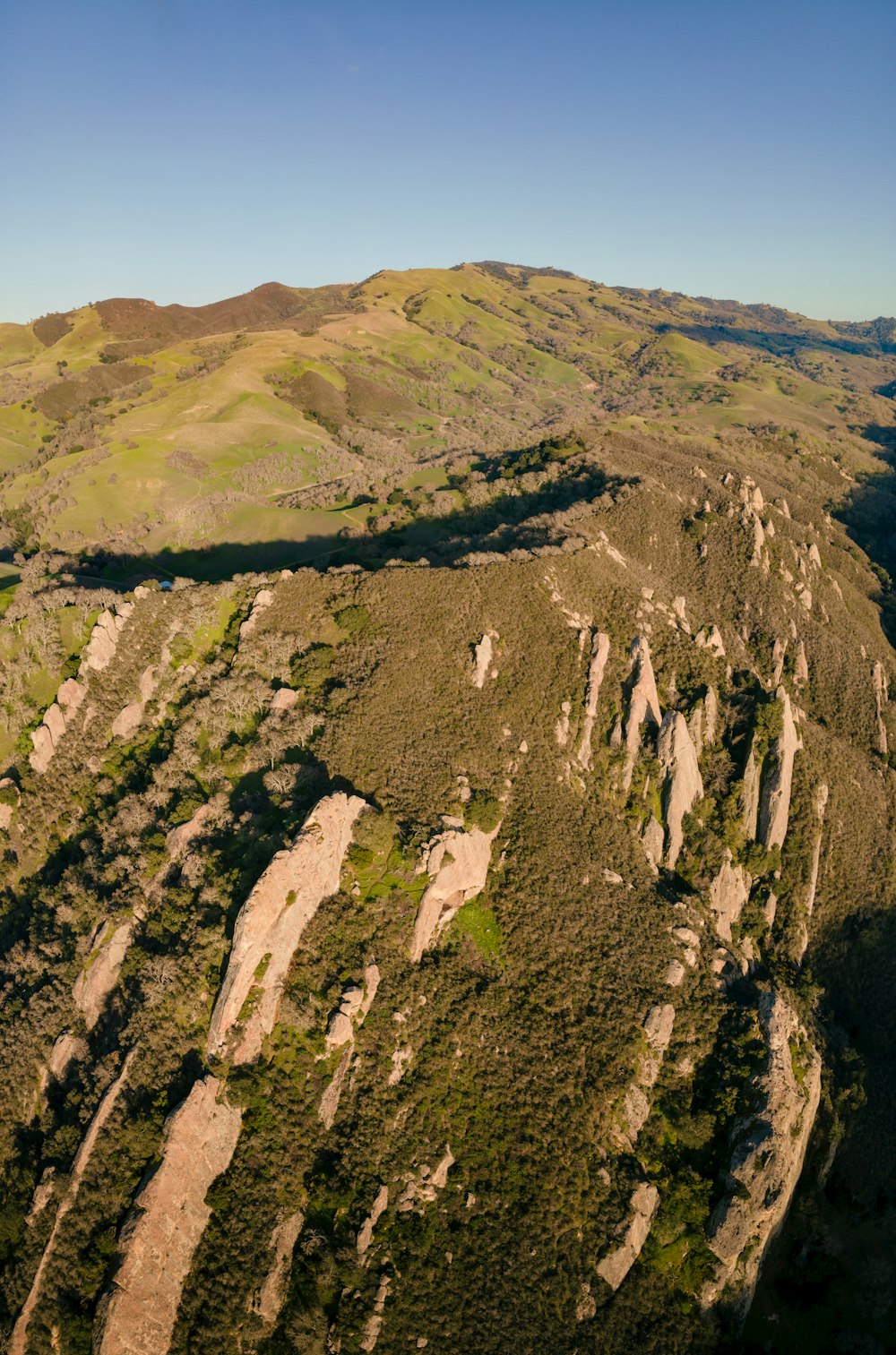 an aerial view of a rocky mountain range