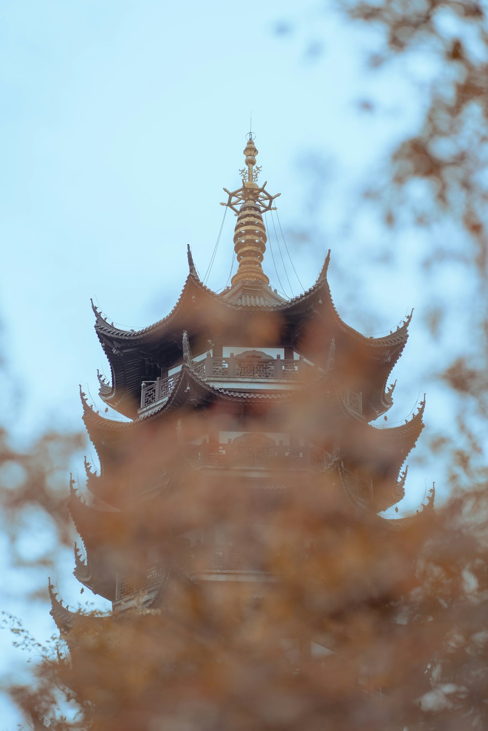 a tall tower with a clock on top of it