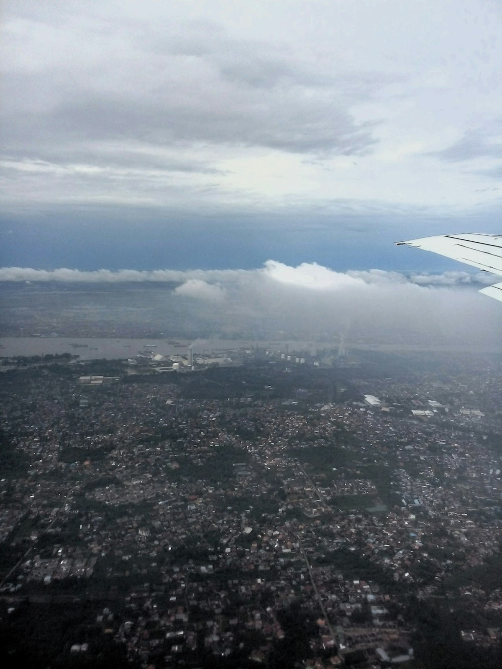 a view of a city from an airplane