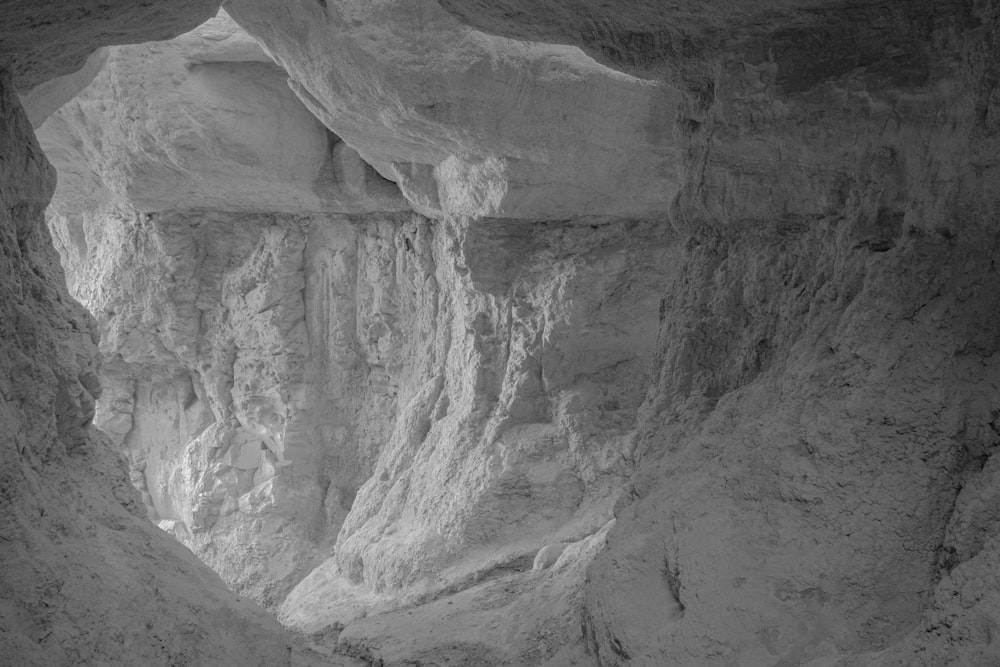 a black and white photo of a cave