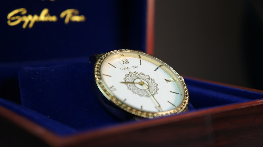 a close up of a watch in a box