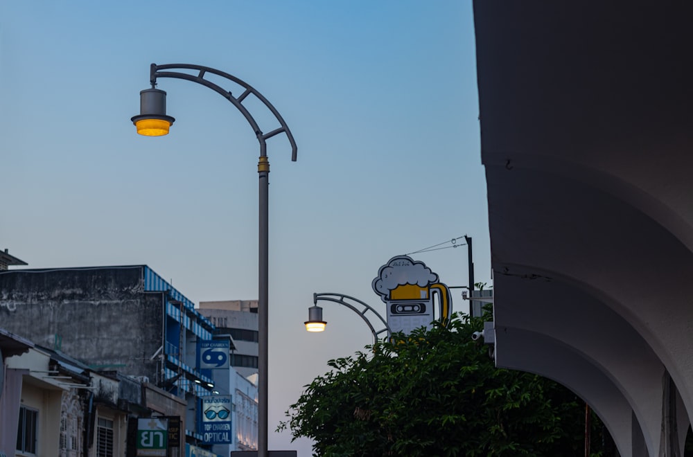 a street light on a city street next to a building