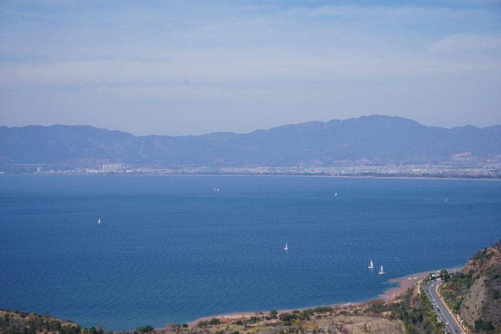 a large body of water surrounded by mountains