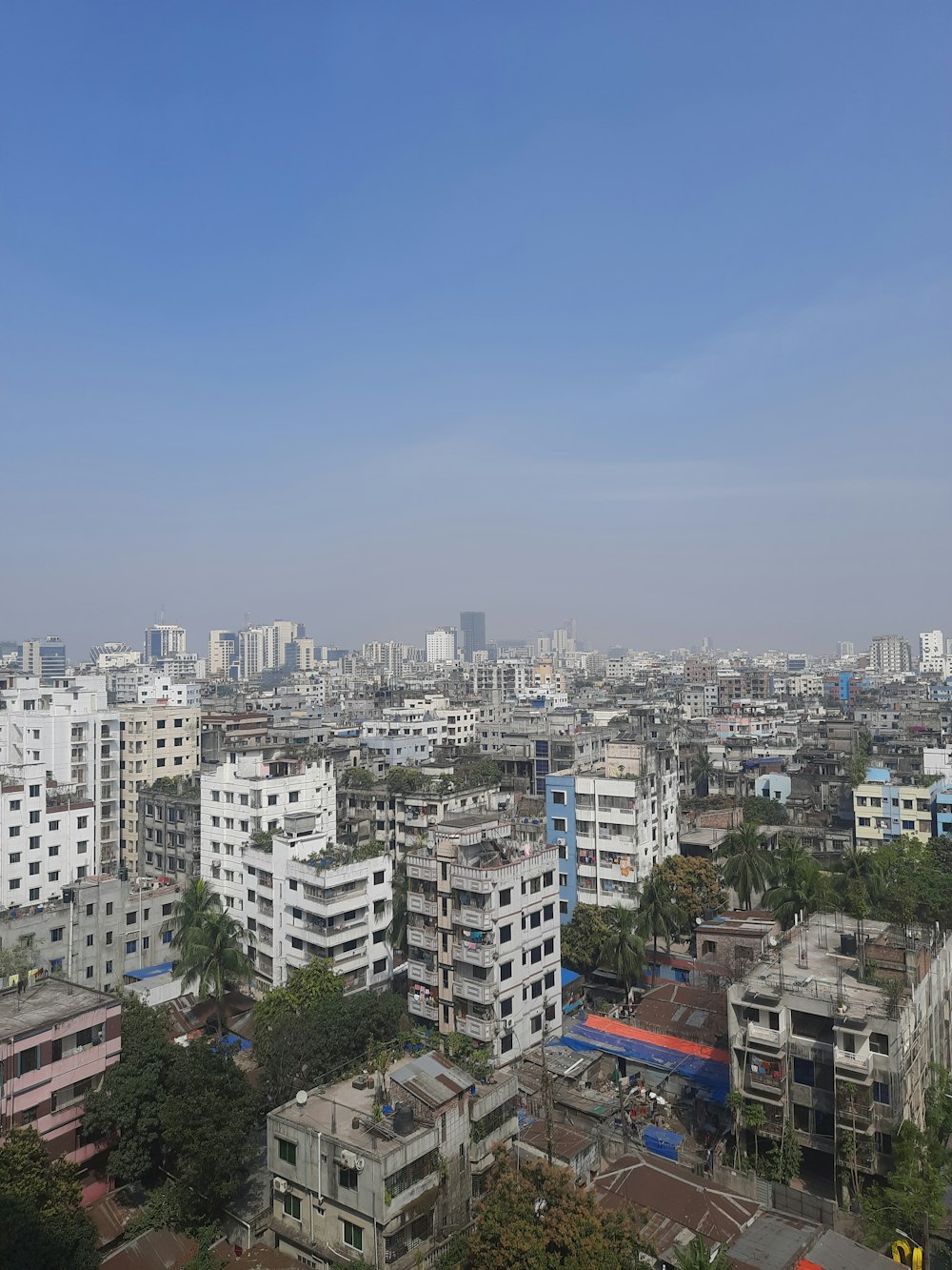 a view of a city with tall buildings