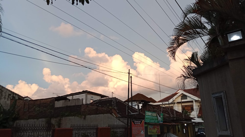 a view of a street with power lines in the background