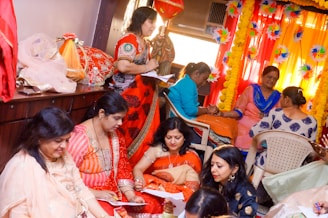a group of women sitting next to each other
