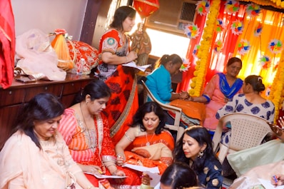 a group of women sitting next to each other