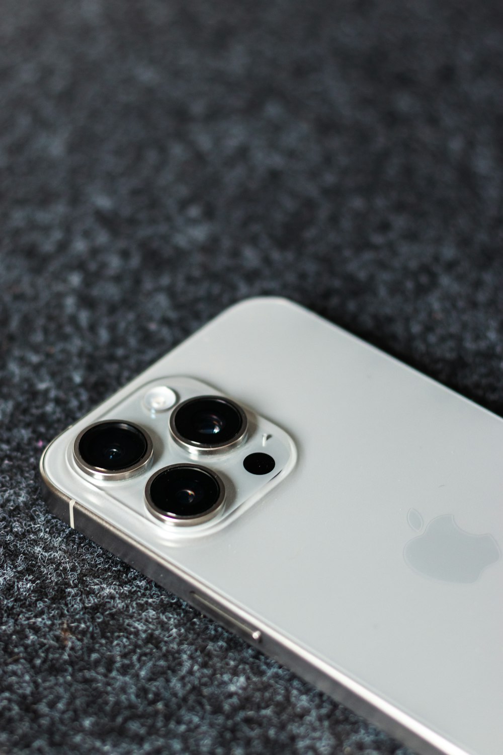 a close up of a cell phone on a table