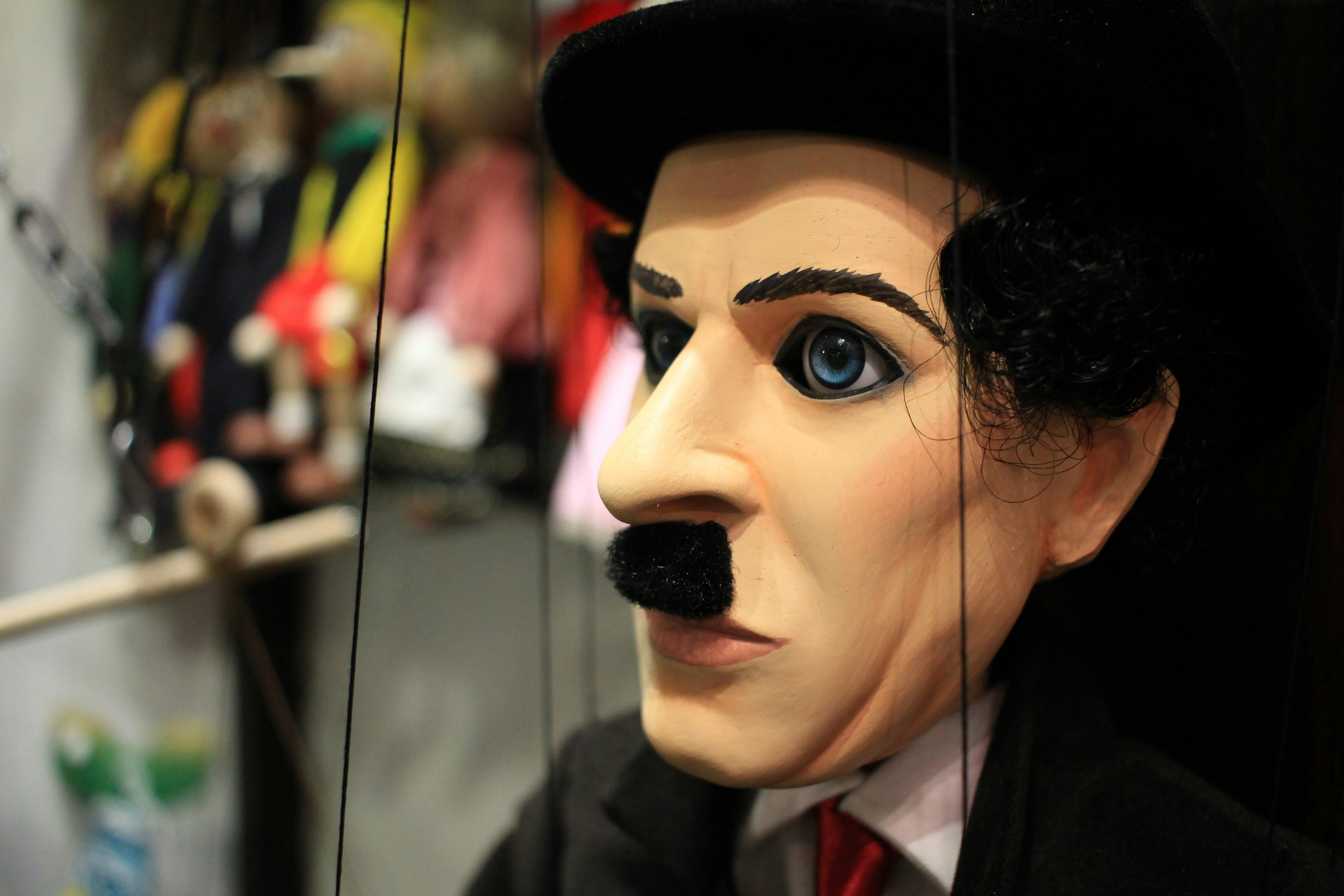 a mask of a man with a mustache and a top hat, Charlie Chaplin Czech Marionette Puppet