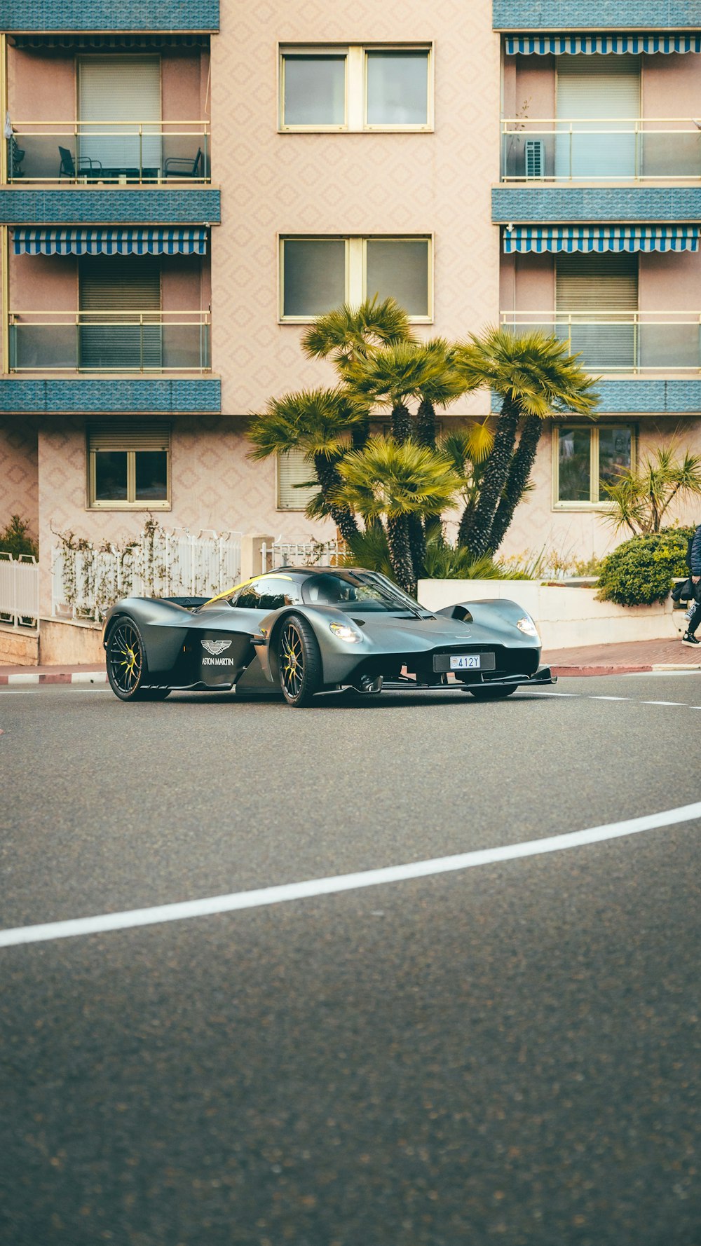 two cars parked on the side of the road