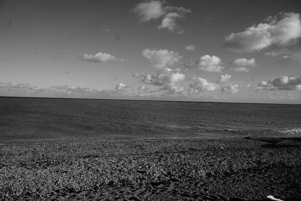 a black and white photo of the ocean