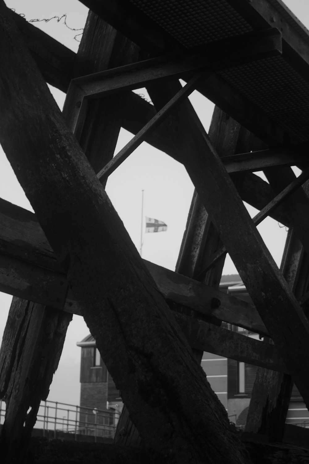 a black and white photo of a wooden structure