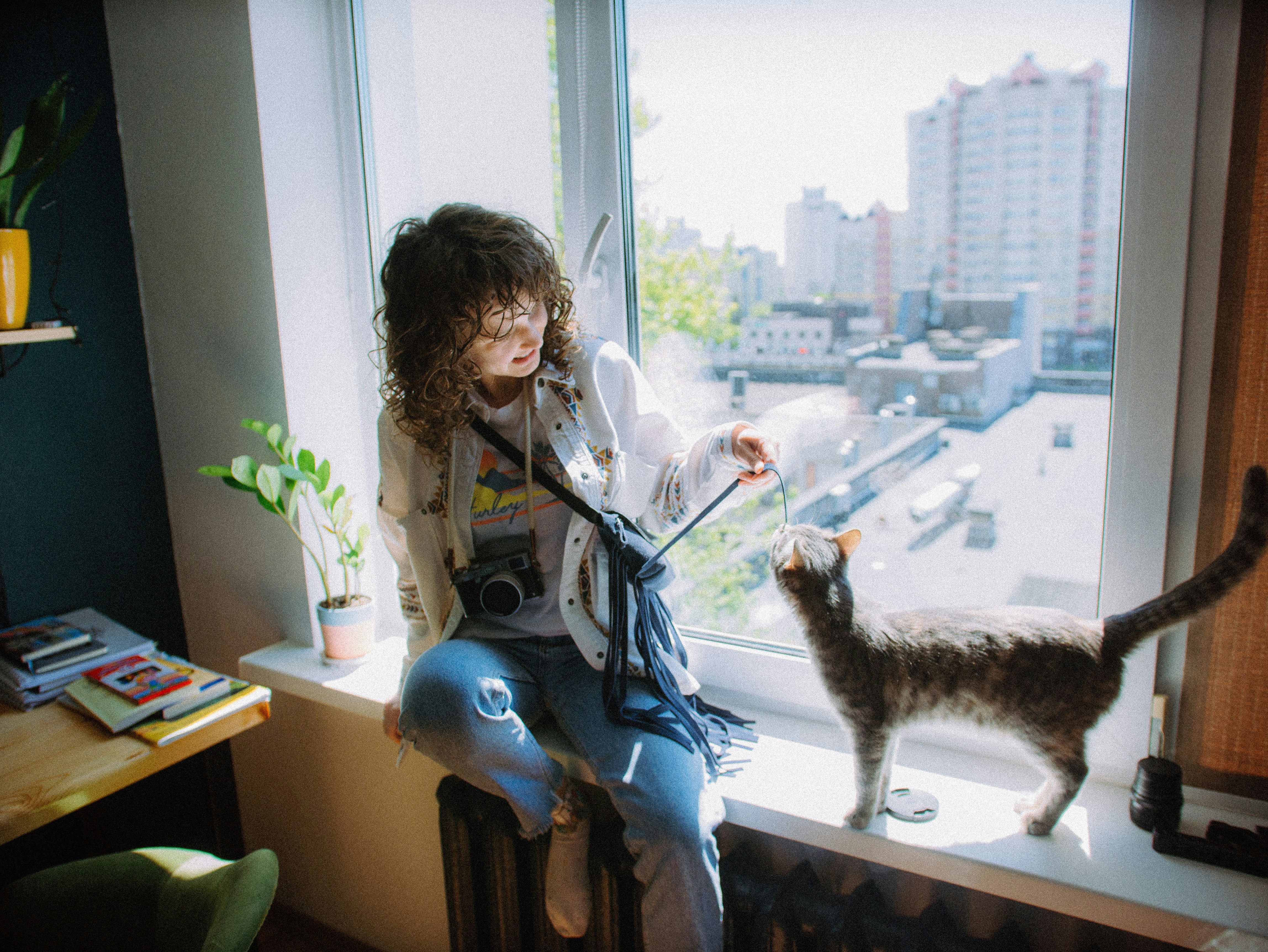 A tenant at home with her cat