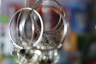 a close up of a bunch of rings hanging from a hook