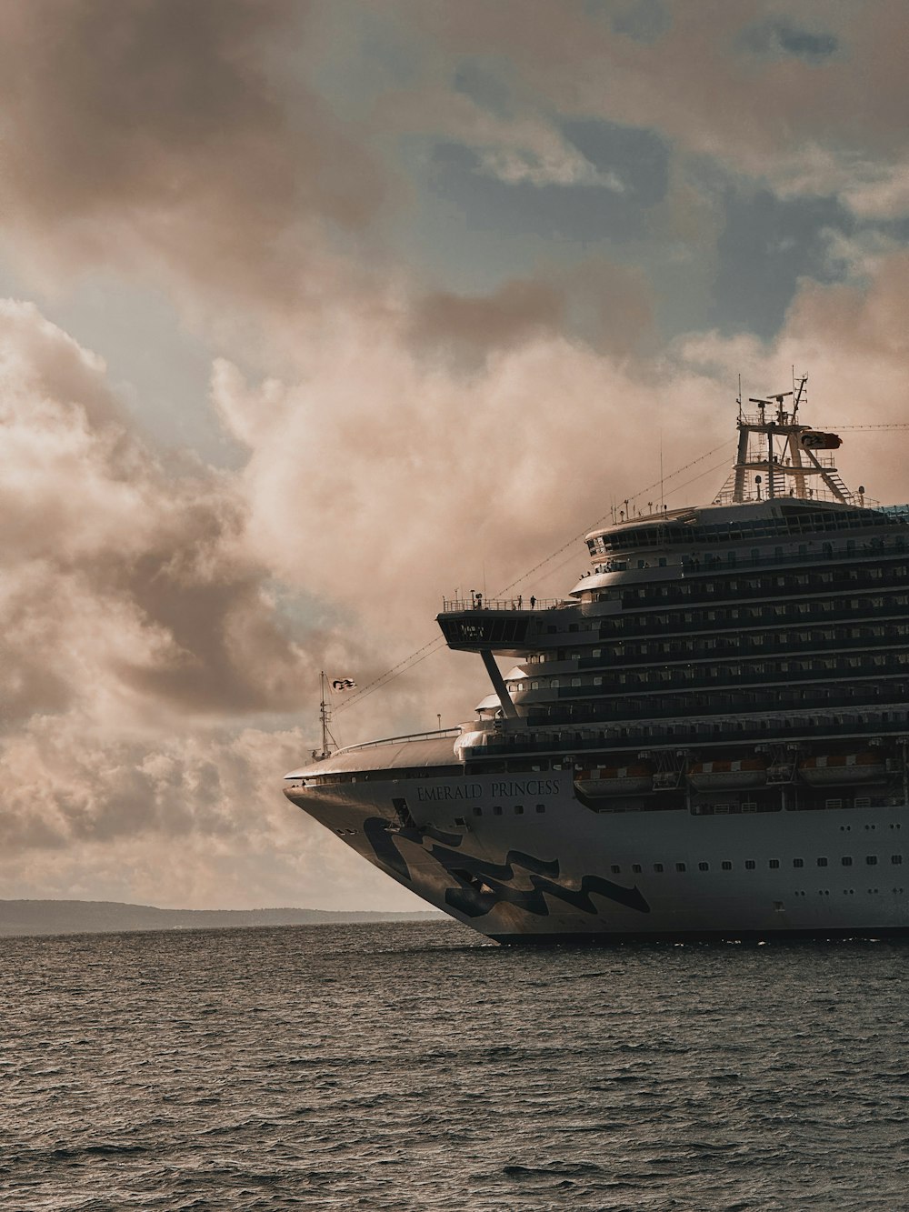 a large cruise ship in the middle of the ocean