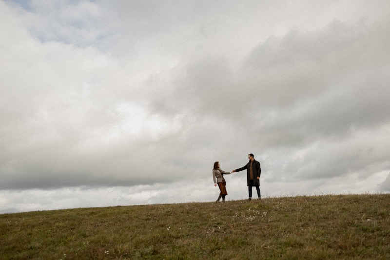 Romantic couple on grassy hill