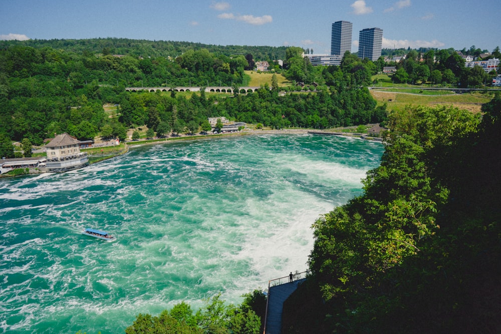 a view of a large body of water with a city in the background