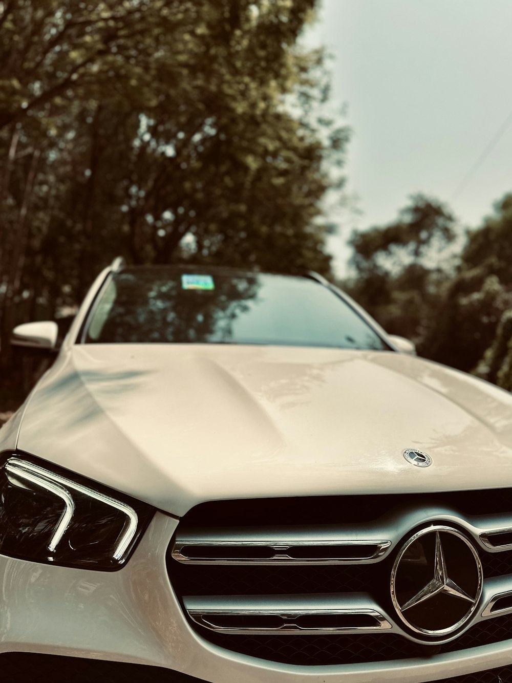 a white car parked on the side of the road