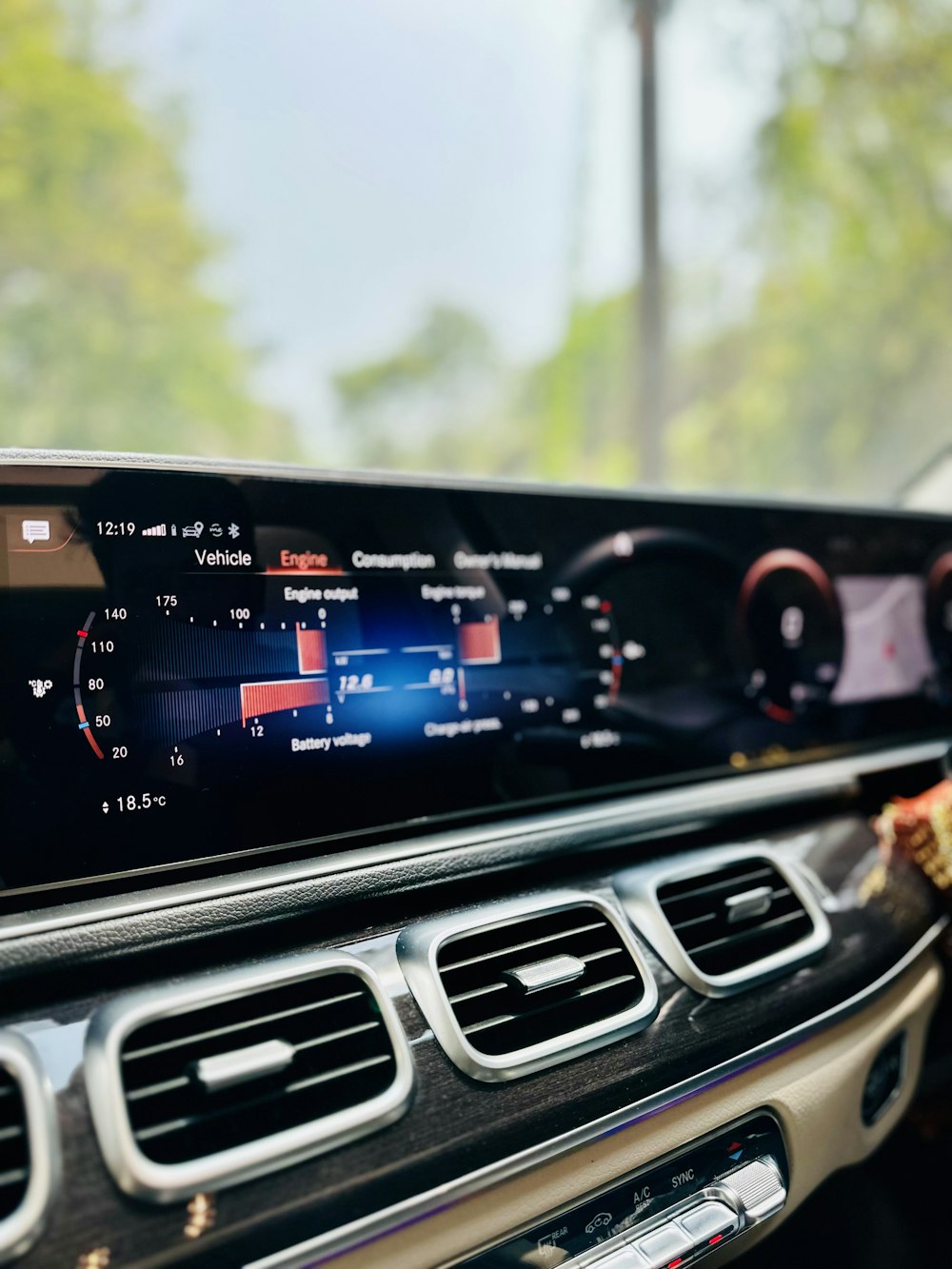 the dashboard of a car with a digital display