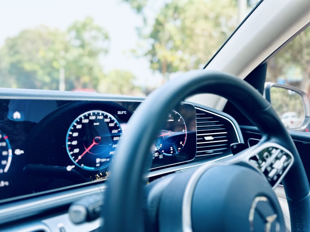 the dashboard of a car with a speedometer