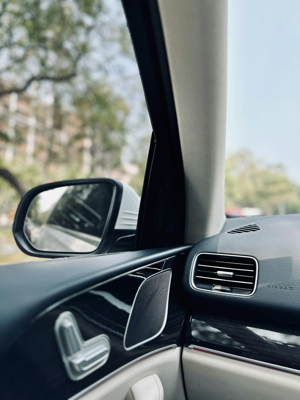 a view of the inside of a car from inside the vehicle