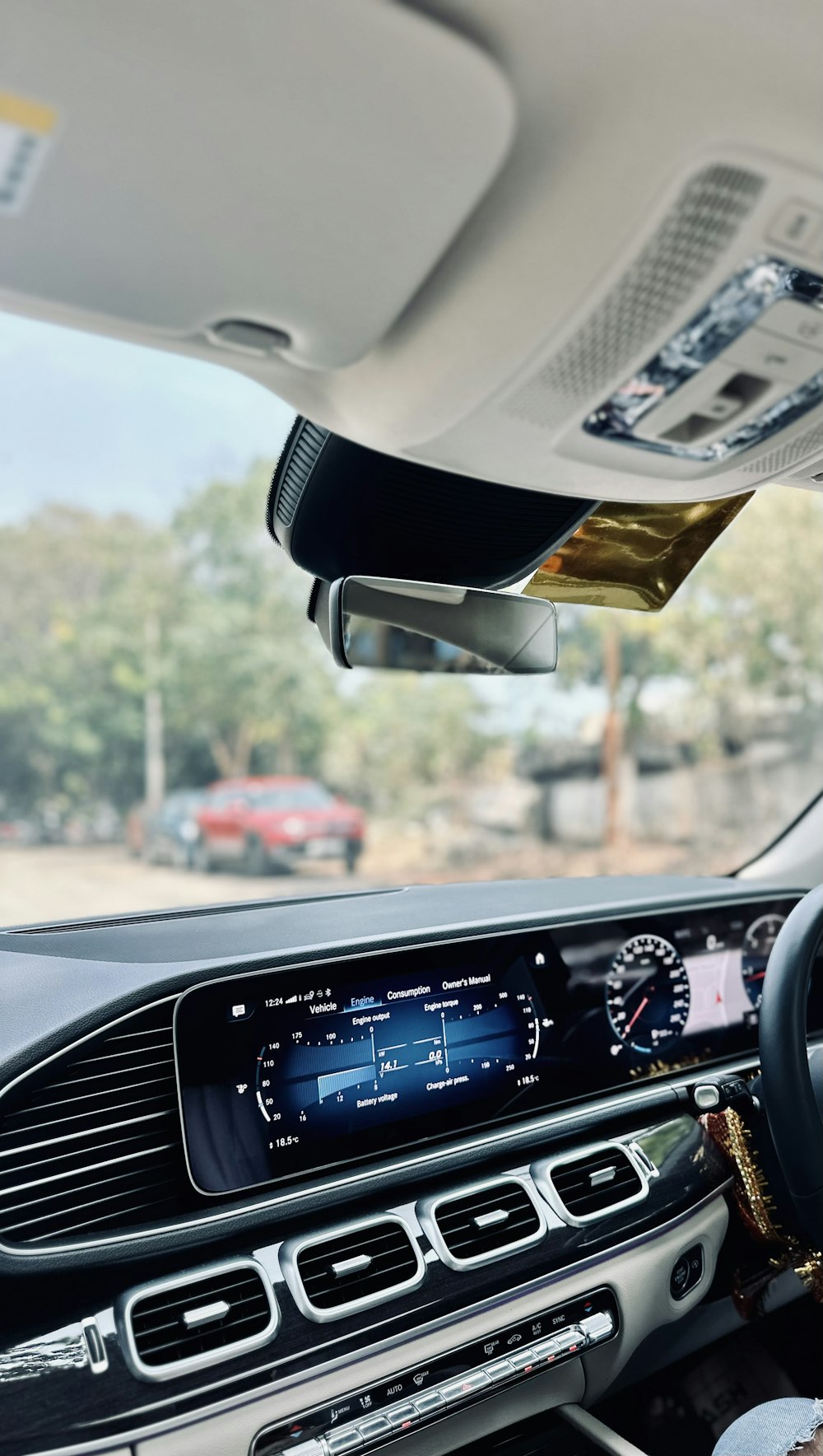 the dashboard of a car with a digital display