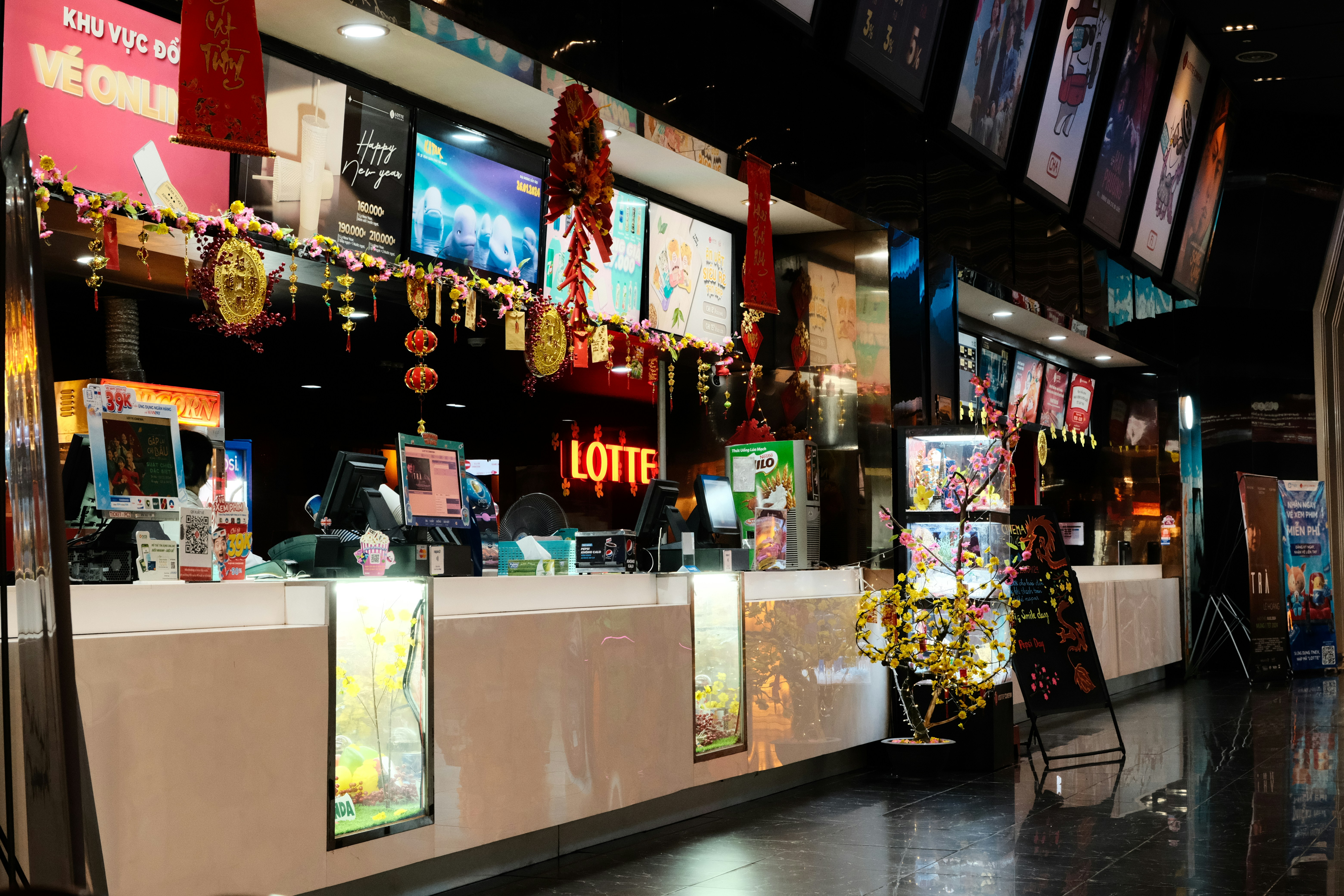 A store front with a lot of signs on the wall photo – Free Urban Image ...