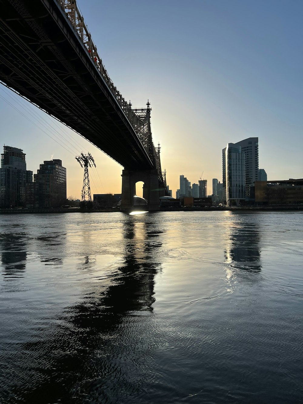 a large bridge spanning over a large body of water