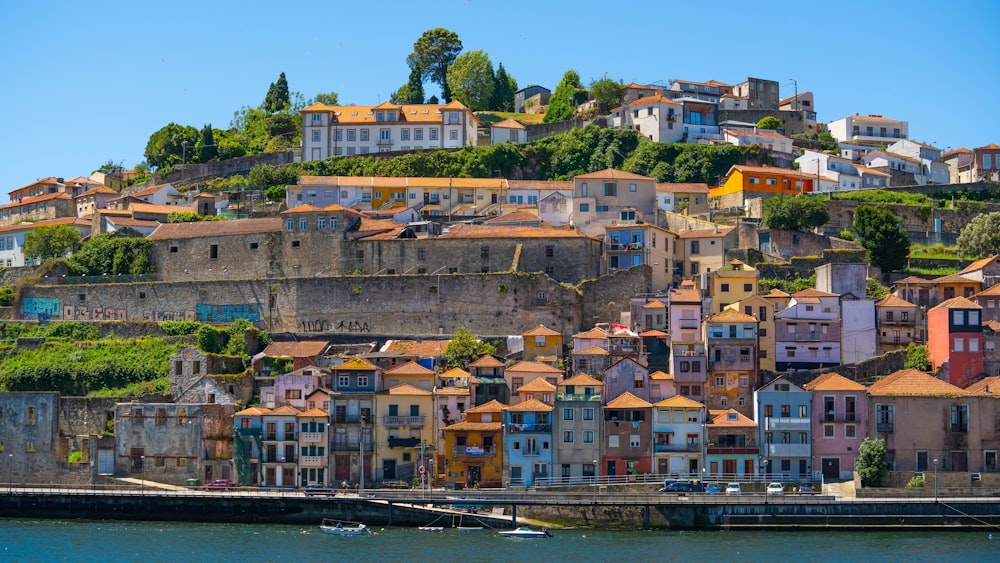 a city with lots of buildings on a hill