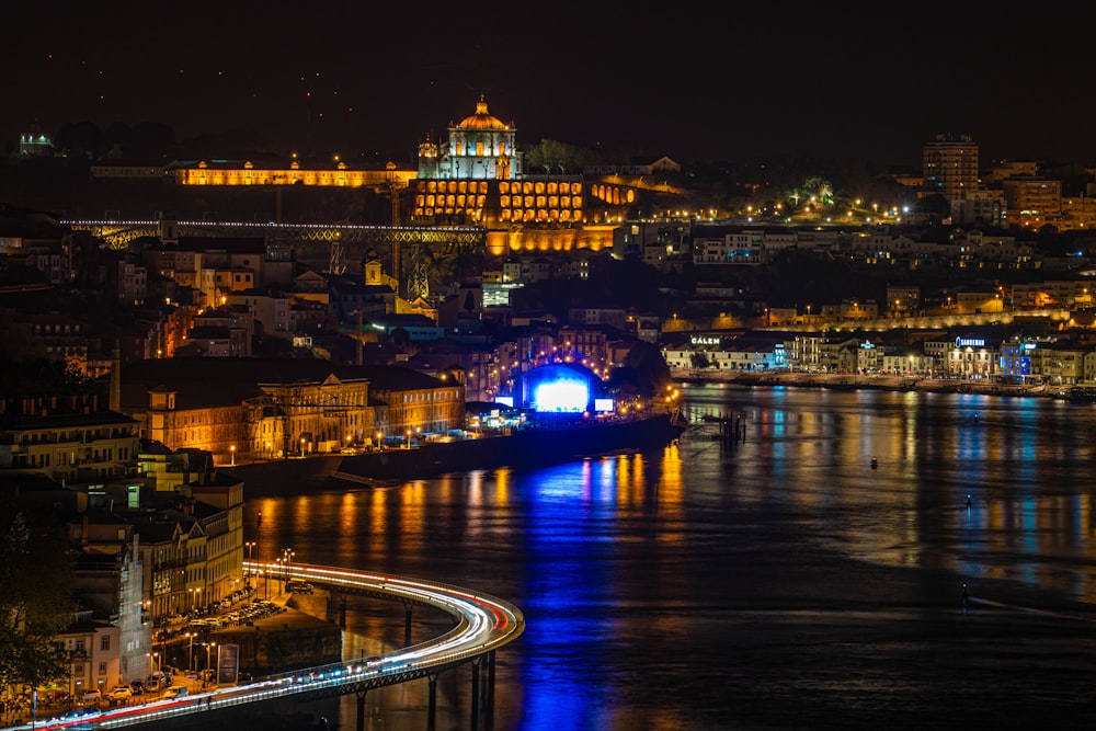 a view of a city at night from across the water