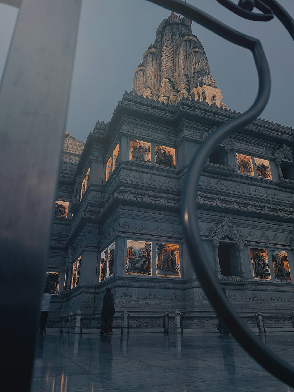 a very tall building with a clock on it's face