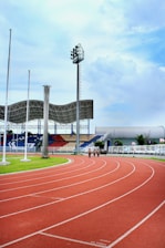 a track with a few people walking on it