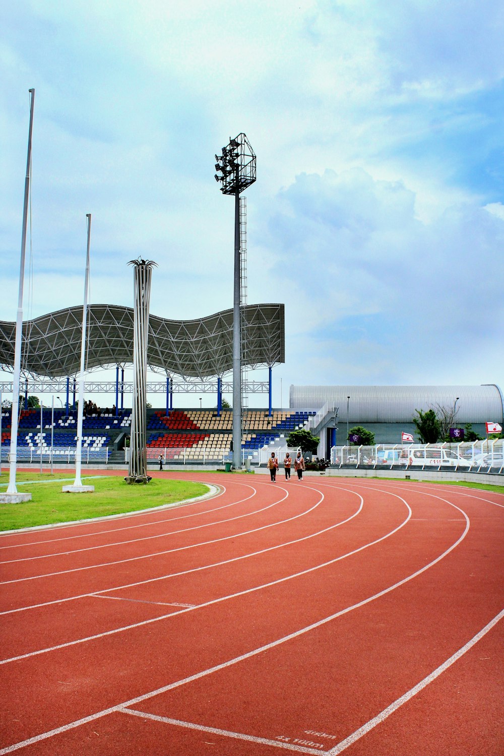 a track with a few people walking on it