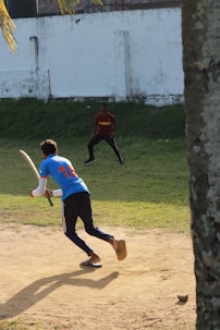 a group of young men playing a game of frisbee