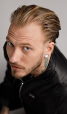 Male wearing invisible hearing aids