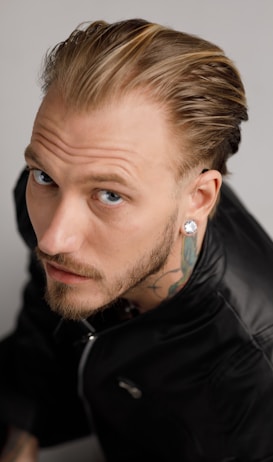 Male wearing invisible hearing aids