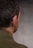 a man with a pair of ear buds in his ears