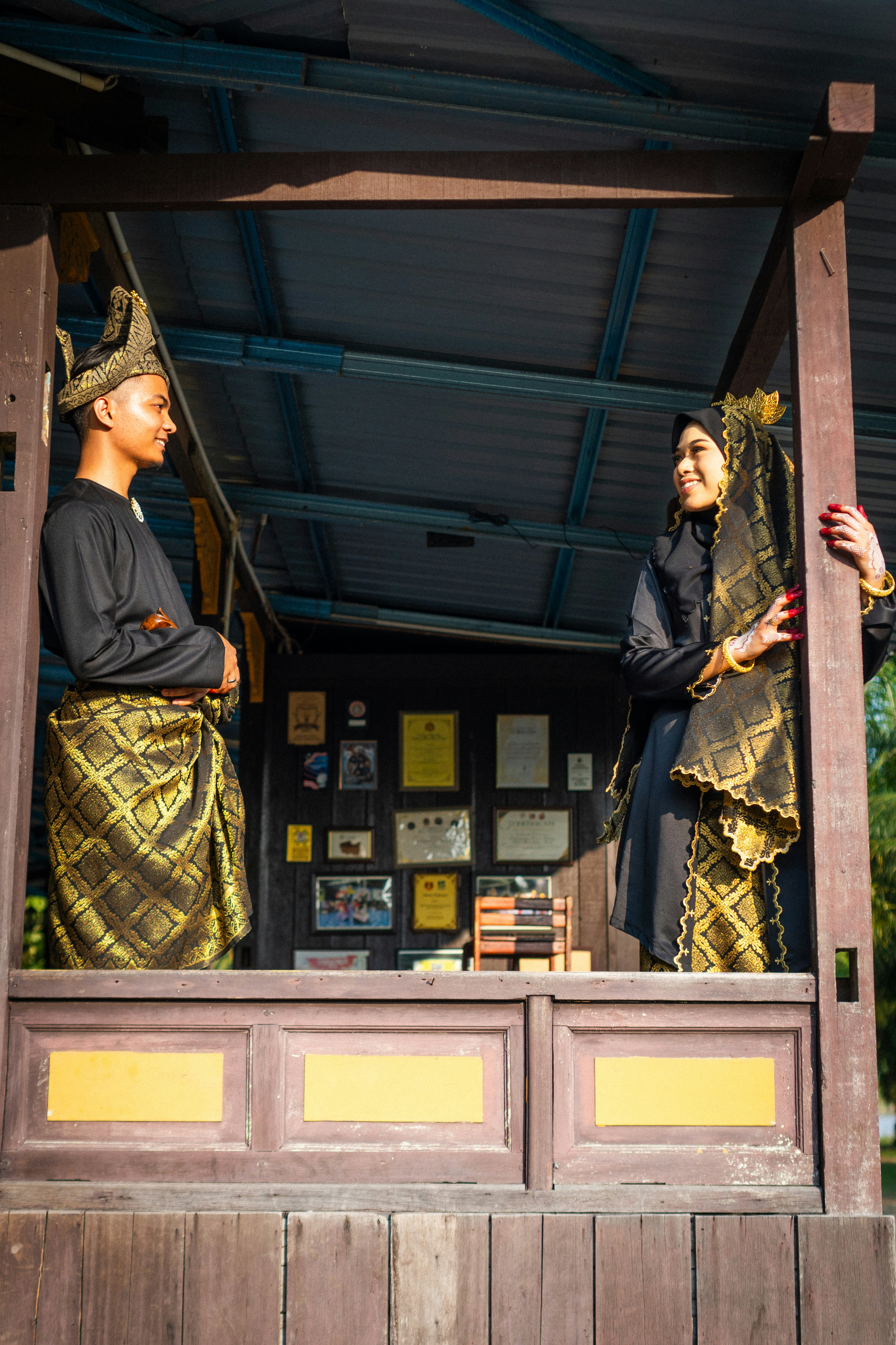 Couple standing on a wooden platform