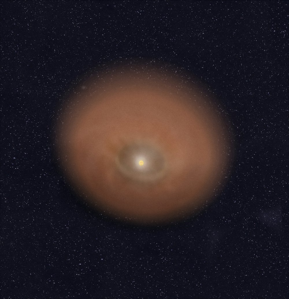 a brown object in the middle of the night sky