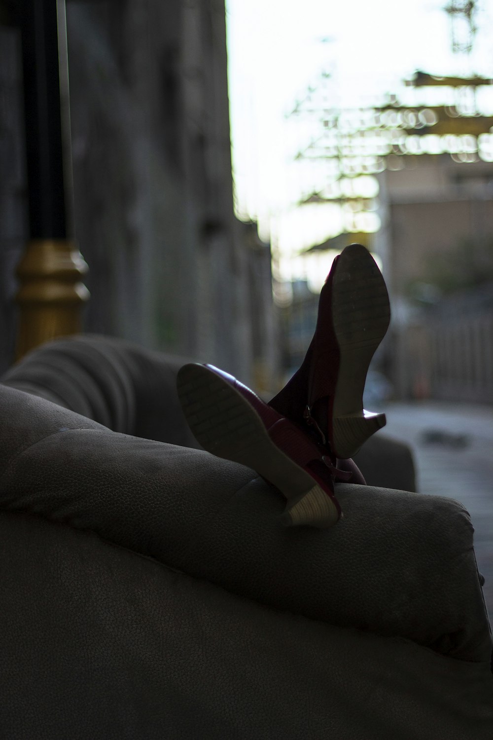 a close up of a pair of shoes on a couch