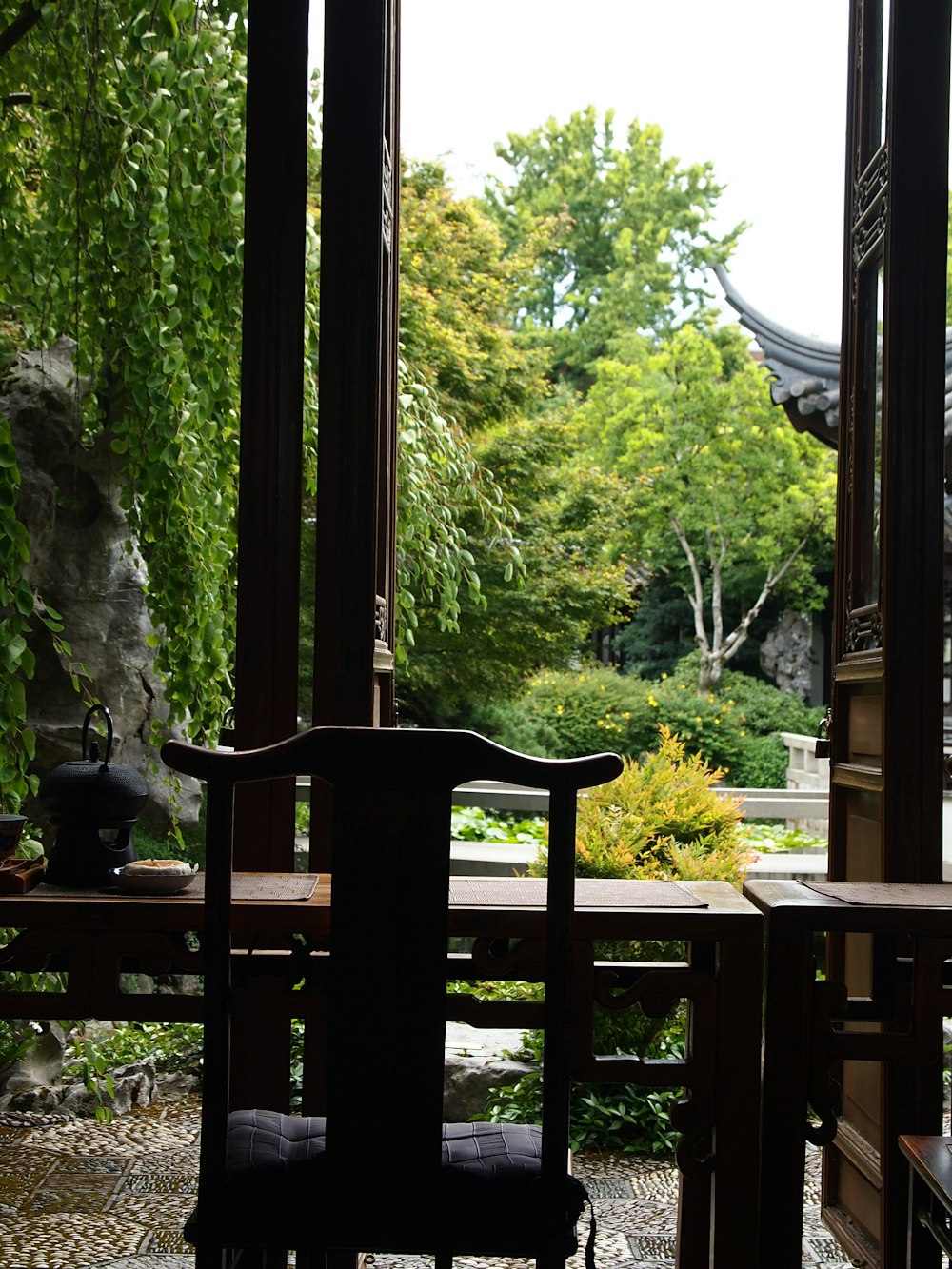 a chair sitting on top of a wooden table