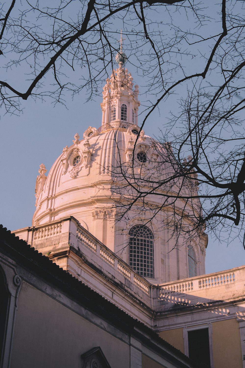 a tall building with a dome on top of it