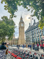 a large clock tower towering over a city