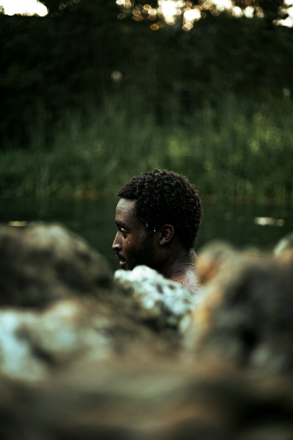 a man sitting in a body of water