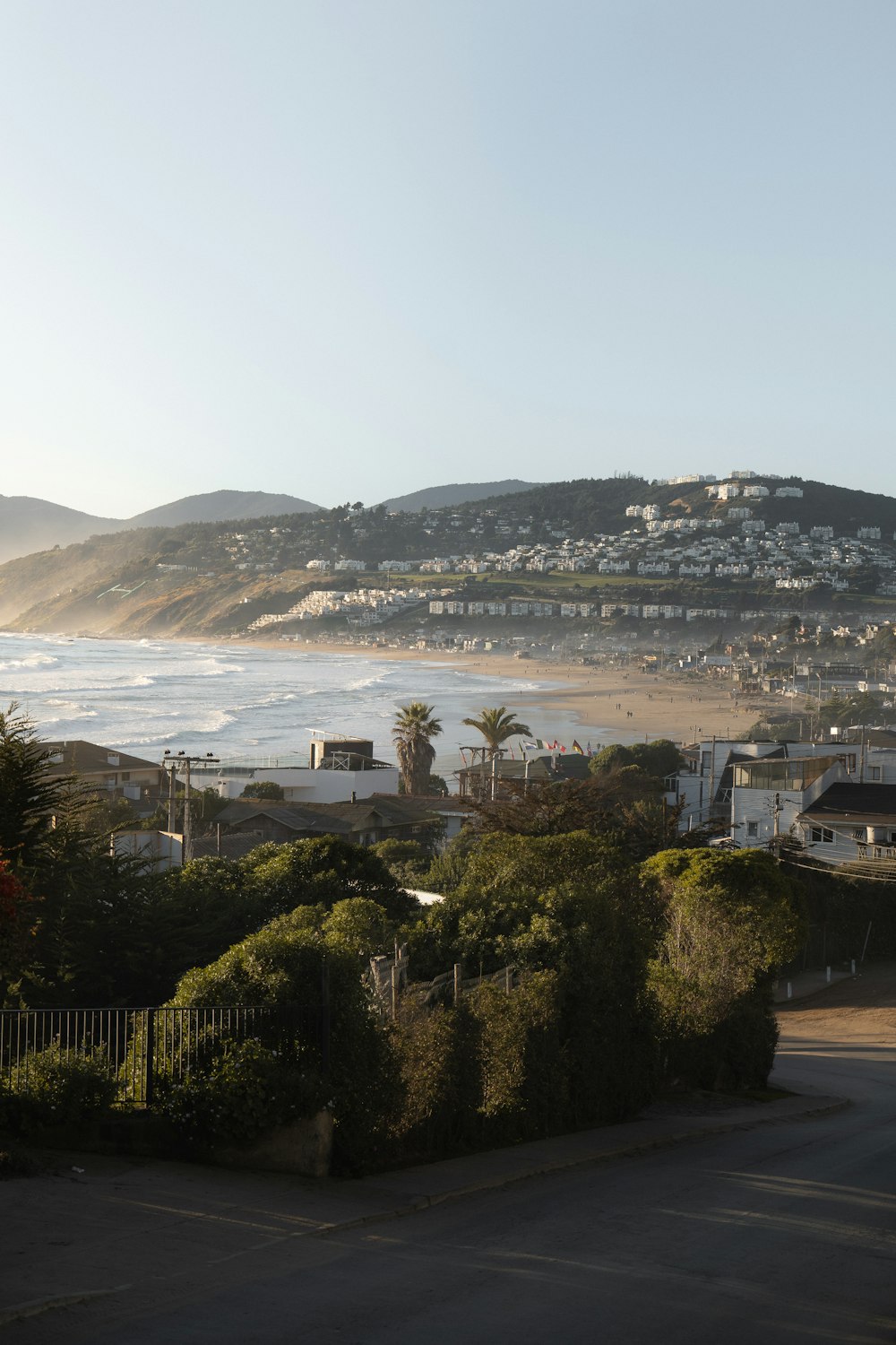 a view of a beach from a hill