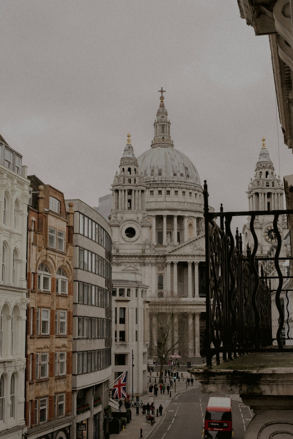 a view of a city from a balcony of a building