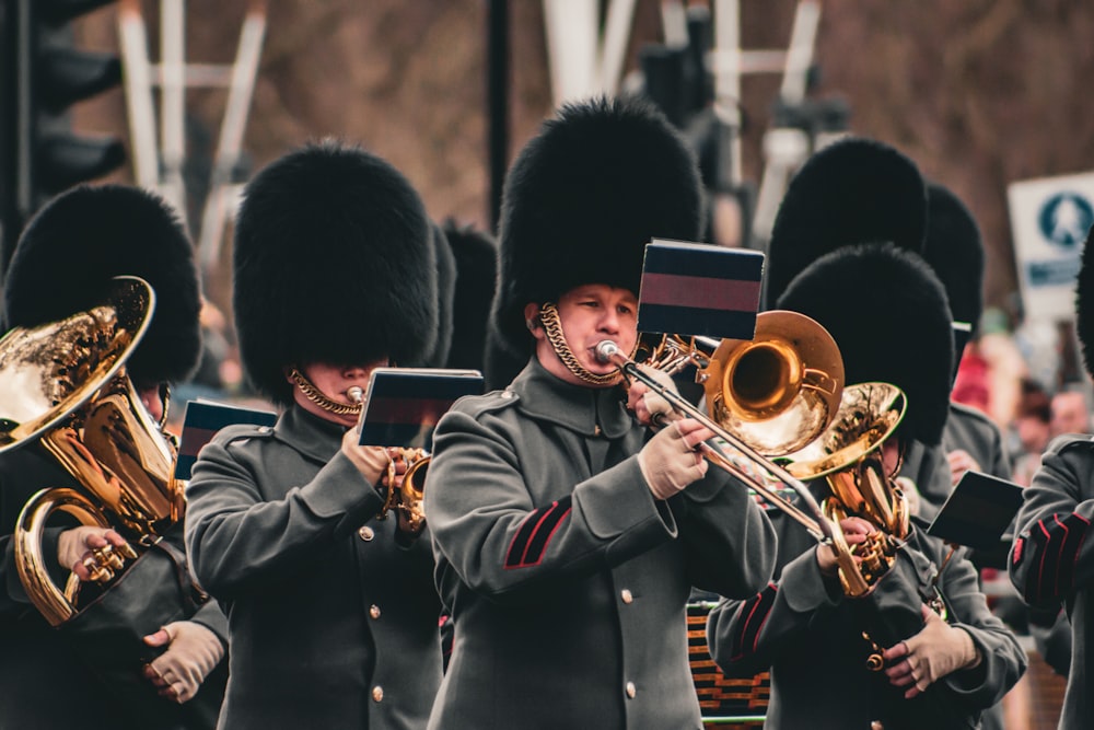 a group of men in uniform playing musical instruments